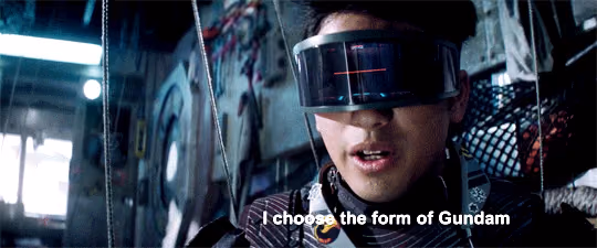 A short clip from Ready Player One of a man in a VR visor that flashes orange kanji.