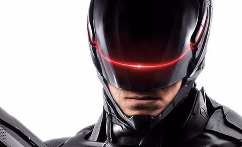 A close-up of the RoboCop reboot helmet with its red visor light.